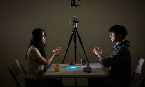 Students using AI guided projector