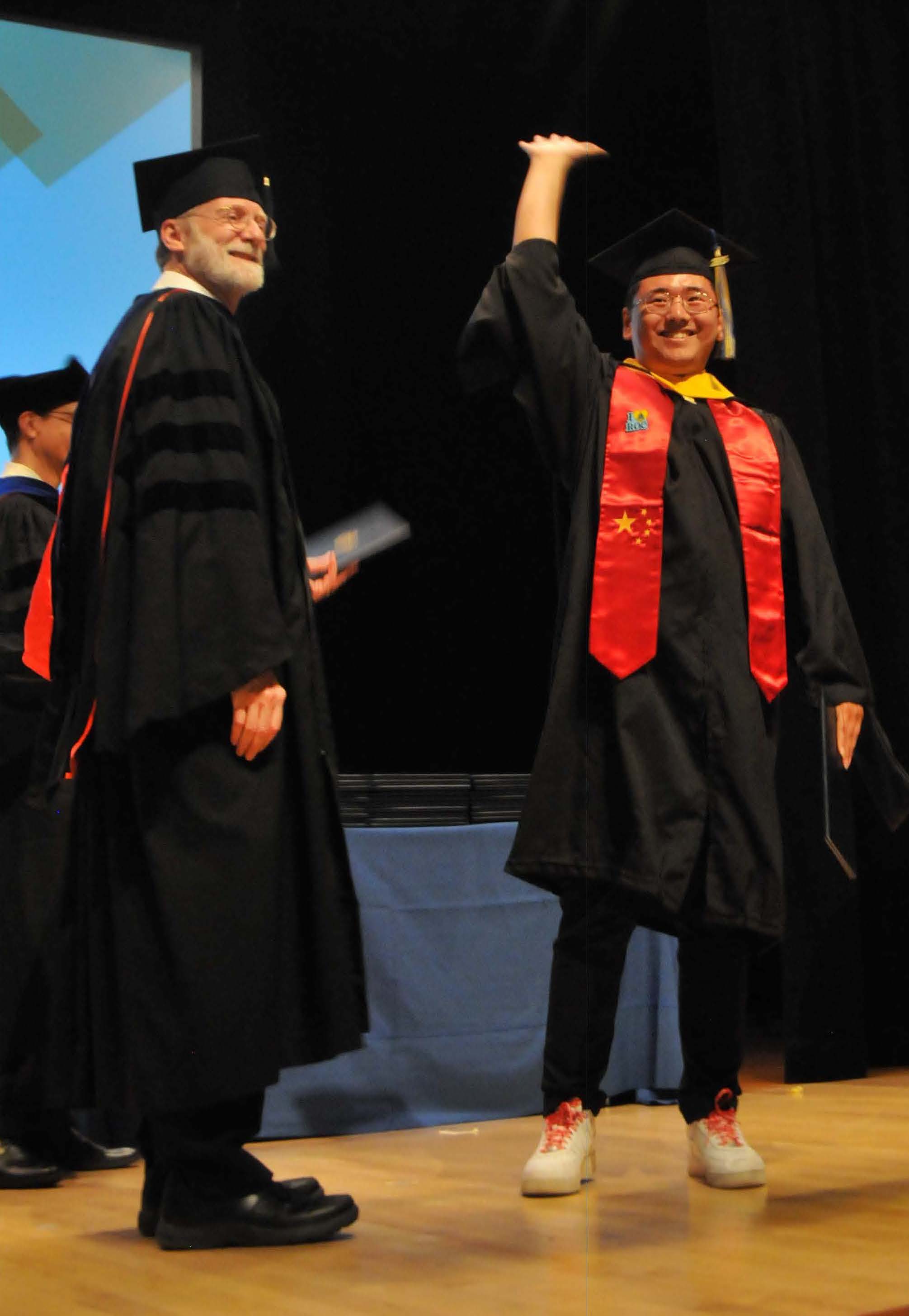 student raising hand